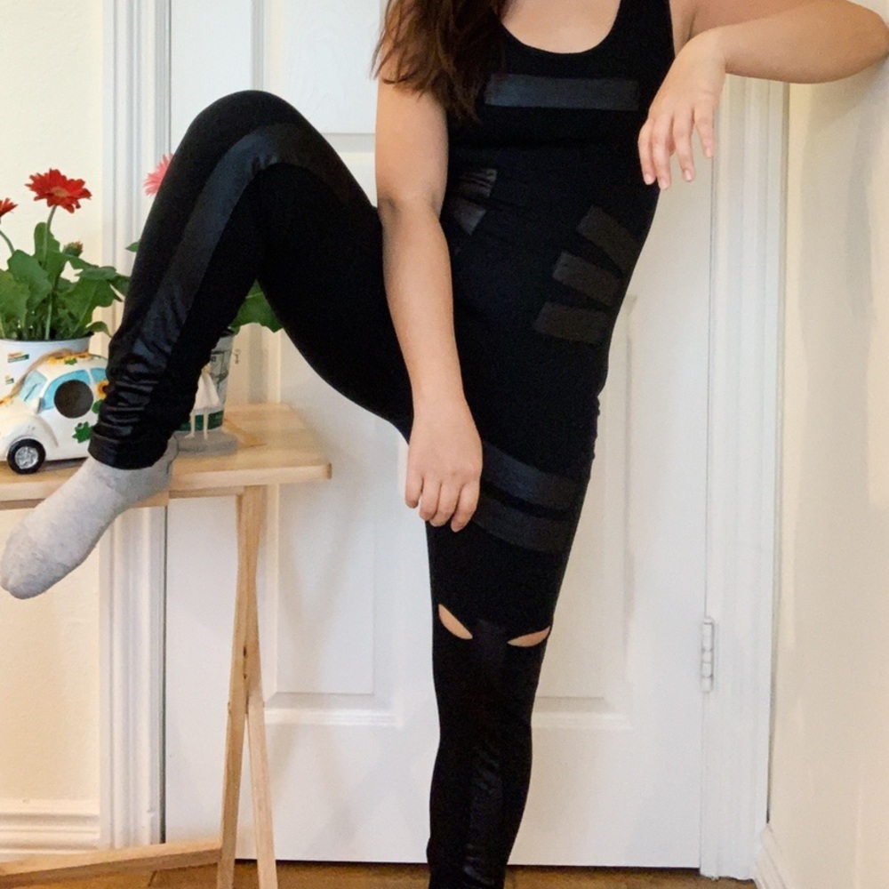 Black jumpsuit with faux leather patch